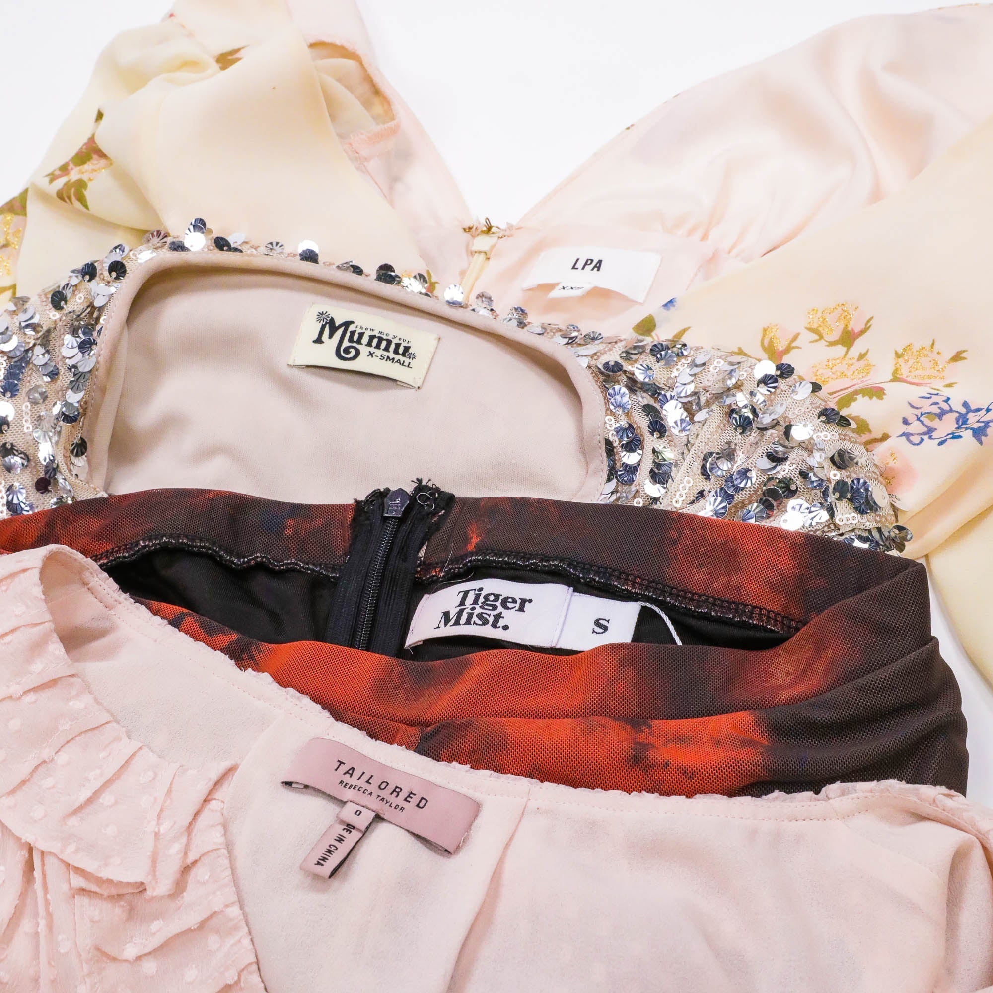 Deluxe & Designer Women’s Secondhand Wholesale Clothing - NuSource